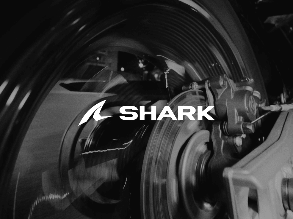 Close up of a motorcycle rear wheel at night